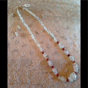 NEW genuine stone necklace and earring set.